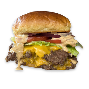 Lab Classic smash burger with two beef patties, melted cheese, lettuce, tomato, red onion, and creamy sauce on a toasted bun